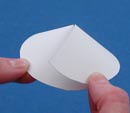 Overlap the paper at the slit to create a nose cone