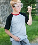 A boy ready to crack open a geode